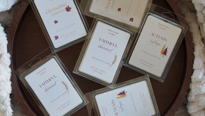 Abundant Season Wax melts in a brown round container each laying flat