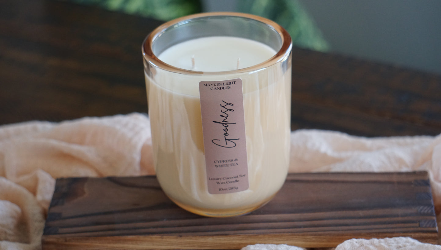 Candle with a label on a wooden board