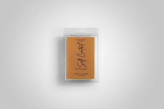 Wax melt packaging with 'Soft Couture' branding on a light gray background